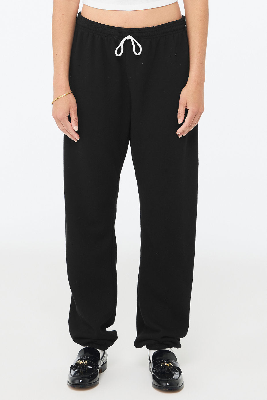 Black unisex sponge fleece long scrunch pant with drawstring waist and retail fit