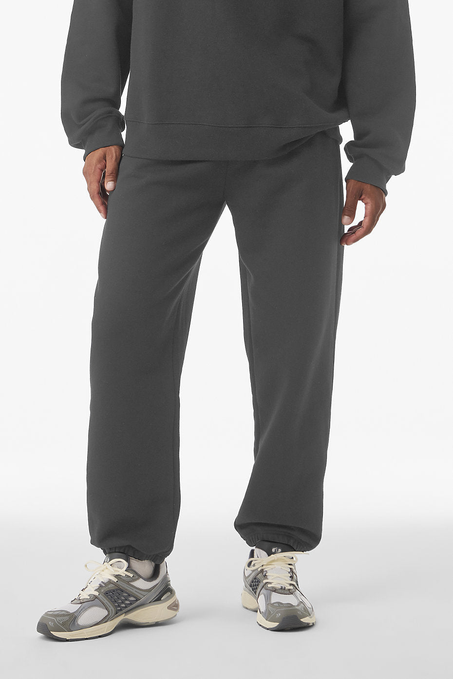 Unisex heavyweight charcoal fleece sweatpant with side pockets and elastic cuffs by Bella+Canvas