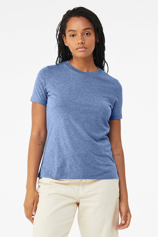 Woman wearing blue Women's Relaxed Triblend short sleeve crew neck tee and light beige pants